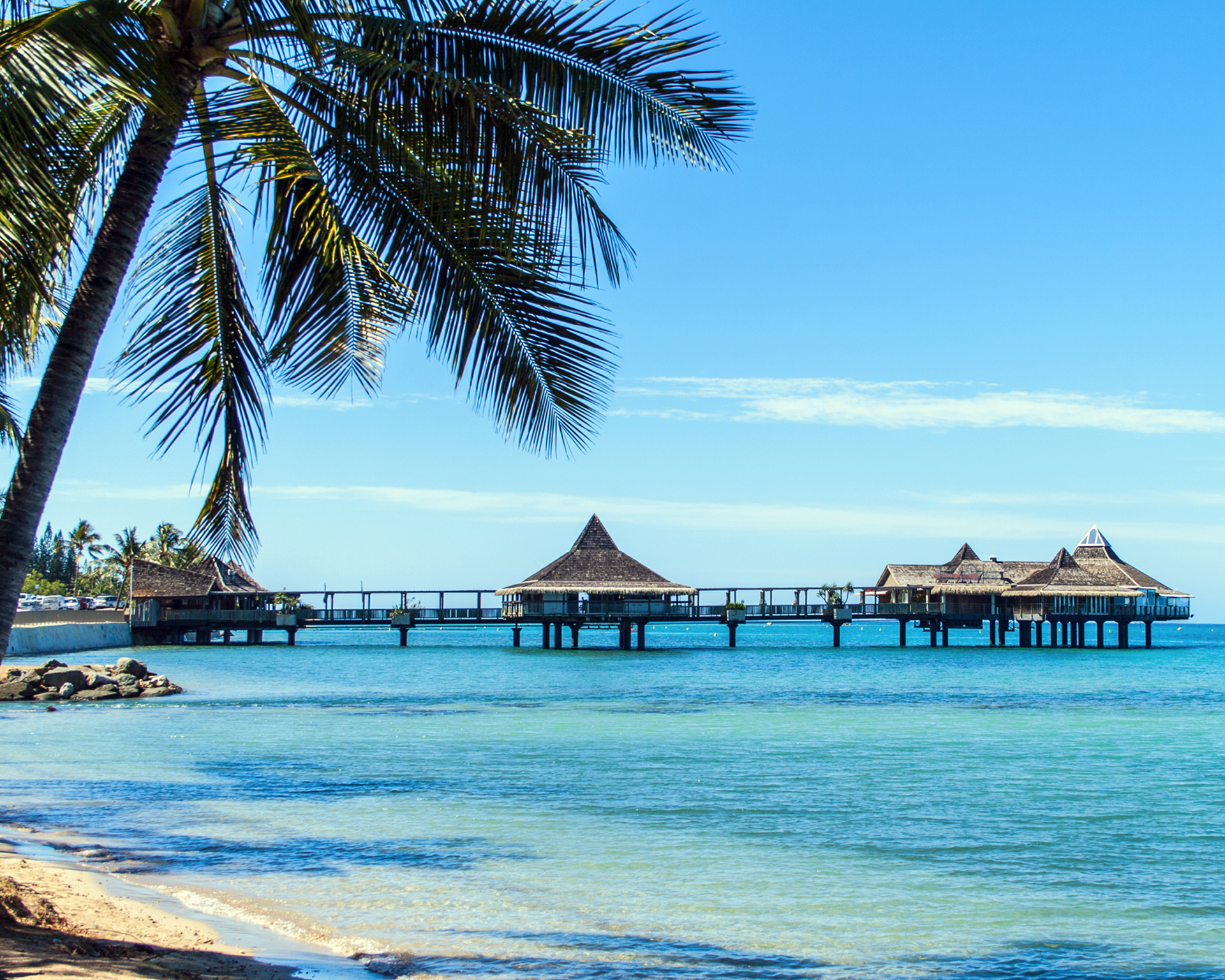 Paradisiacan beach cabins and crystalline waters