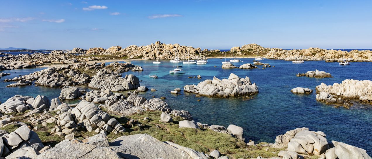 Corsica coast landscape sailboats