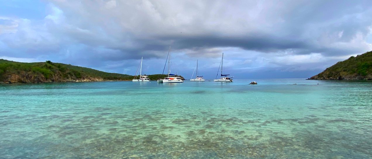 Catamaran yachtes anchored in crystalline sea