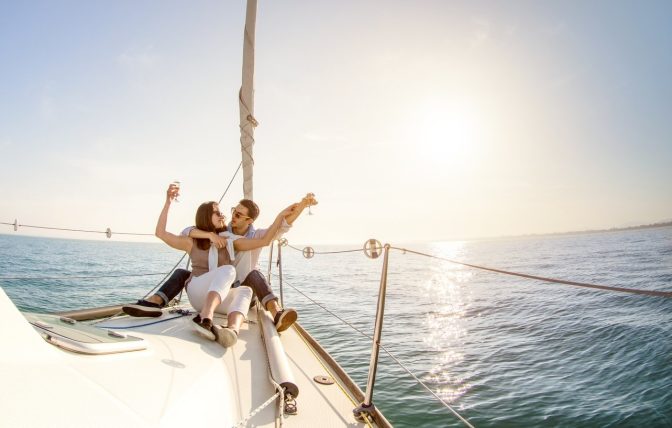 Happy couple on board yacht charter