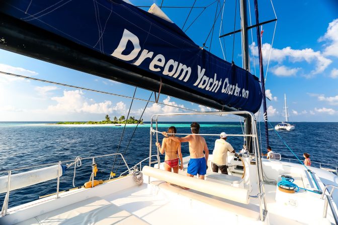 guests and skipper on a boat