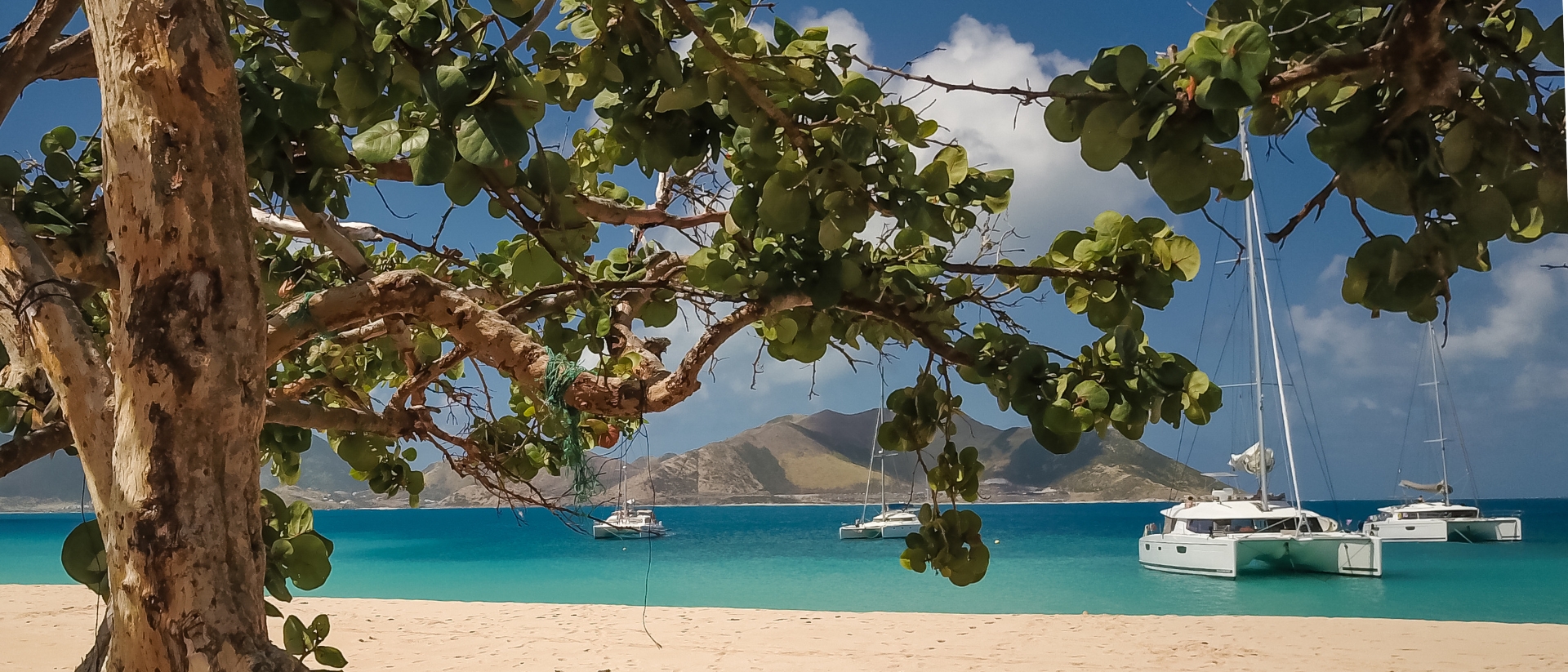 Beach and catamarans in the BVI